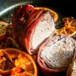 Terrina di carne al vino rosso pistacchi e pere e salsa di pere